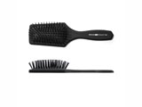 Hair brush with rounded polyamide pins set in pneumatic cushion