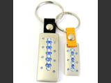 Two silver color rectangle shaped key rings with Swarovski crystals